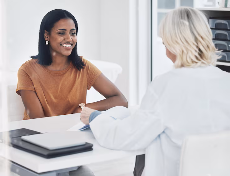 women doctor patient with paperwork conversation insurance check medical history clinic medic people documents with question consultation happy test results hospital 590464 368010